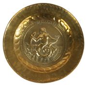 Unusual brass Alms dish, the centre with a Mermaid holding a fish with a star, sun and arch