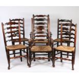 Matched set of six 19th Century ladder back dining chairs, to include two armchairs and four