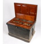 Late Victorian tool chest, the black painted exterior with iron carrying handles and banding, the