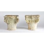 Pair of reconstituted capitals, in the Roman Corinthian form, 27cm high, (2)