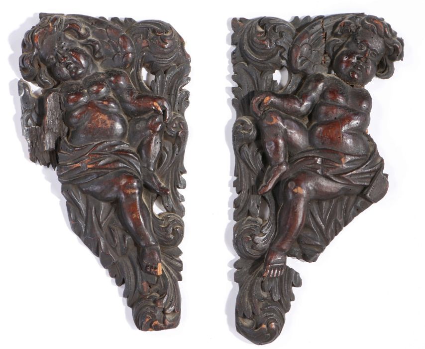 Pair of 17th Century walnut appliques, designed as spandrels, carved as cherubs among scrolling - Image 2 of 2