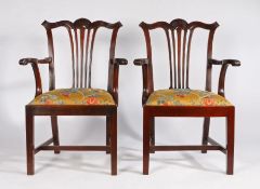 Pair of George III style mahogany elbow chairs, the reeded cresting rails above pierced splats,