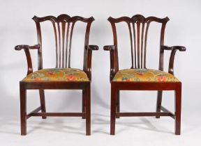 Pair of George III style mahogany elbow chairs, the reeded cresting rails above pierced splats,