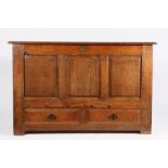 George III oak mule chest, the rectangular hinged top above three fielded panels and short drawers