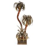 Unusual French lamp modelled as a palm tree, the brass leaves above bark effect stems, raised on a