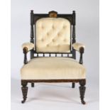 19th Century Aesthetic movement armchair, the ebonised frame with painted bird to the cresting rail,