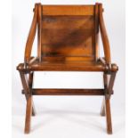 Glastonbury type oak armchair, 20th Century, the panel back above a solid seat flanked by sweeping