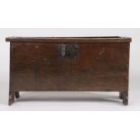 Charming 17th Century oak plank coffer, the rectangular framed panel top opening to reveal a