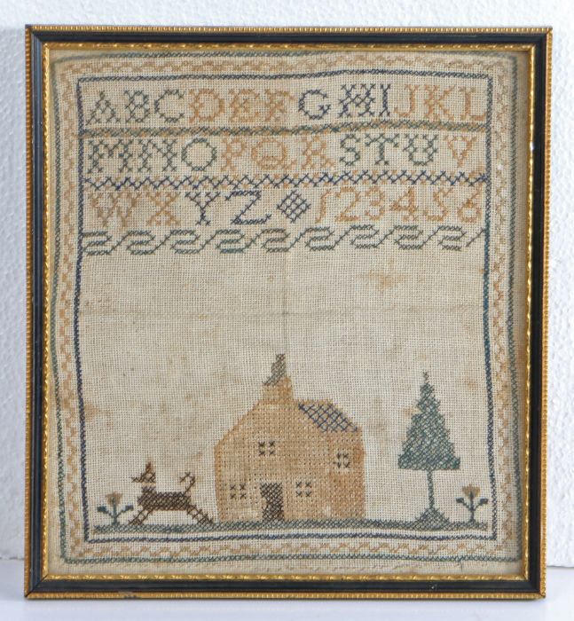 19th Century sampler, with an alphabet and numbers above a church, dog, flowers and a tree, 21cm x - Image 2 of 2