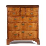 18th Century walnut and oak "Norfolk" chest of drawers, the rectangular oak top above a central