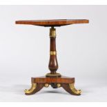 Regency rosewood and simulated rosewood gilt metal mounted low table, the octagonal rotating top