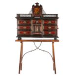 A Flemish Antwerp style walnut and tortoiseshell cabinet, 17th Century elements, the cabinet