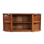 Victorian walnut bookcase, the top with arched ends above a open front and plinth base, 175cm