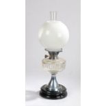 Best British Make oil lamp, with clear glass chimney and white glass globe form shade above a