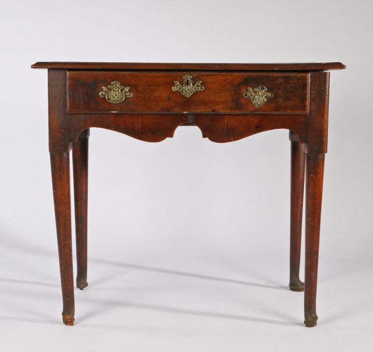 George III fruitwood and mahogany lowboy, the rectangular top above a single long drawer and