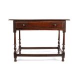 18th Century oak side table, the rectangular top above a frieze drawer and slender turned legs