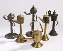 Six oil lamps, to include whale oil examples, three brass, two pewter and a steel example (6)