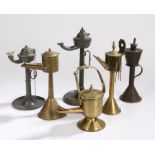 Six oil lamps, to include whale oil examples, three brass, two pewter and a steel example (6)