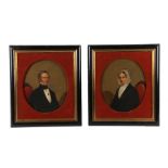 English School (19th century) Portraits of seated husband and wife, a pair, oval mounts, oil on