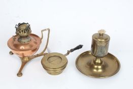 Arts and Crafts style oil lamp, with copper reservoir above a brass handle and tripod foot, W.S.L.