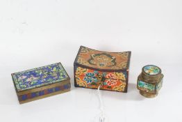 Chinese enamel cigarette box, with brightly coloured flowers and insects, the hinged lid enclosing a