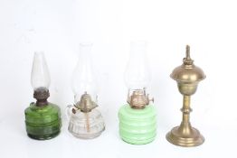 Wight and Butler brass spirit burner, Falks hand oil lamp with green glass reservoir, two similar
