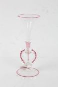 19th century Venetian clear glass vase, highlighted in cranberry, the trumpet shaped vase with three