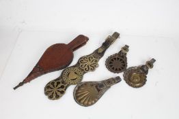 Six horse brasses, mounted on four leather straps, pair of oak and leather bellows (5)