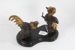 After P J Mene, bronze cockfighting group, raised on a shaped stepped base, 23cm wide