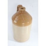 Stoneware paraffin container, embossed "Horne Brothers Moreton in Marsh Paraffin", 33cm high