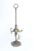 Brass oil lamp, with loop handle, the lamp with bird form handle and attached scissor action