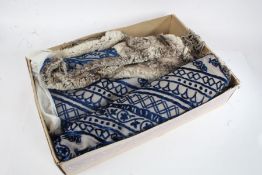 20th century opera shawl, with blue embroidered pattern within a woollen border and tasselled edges,