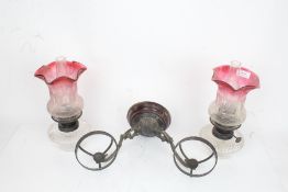 Hinks & Son Birmingham wall mounted twin branch oil lamp, the scrolled acanthus leaf cast arms