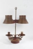 Regency style toleware bouillotte two light candle lamp, painted in iron red and gilt, with