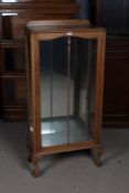Mid 20th Century oak china display cabinet, the glazed door opening to reveal two interior glass