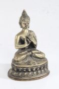 Indian brass buddha, with mark to base, 14.5cm tall