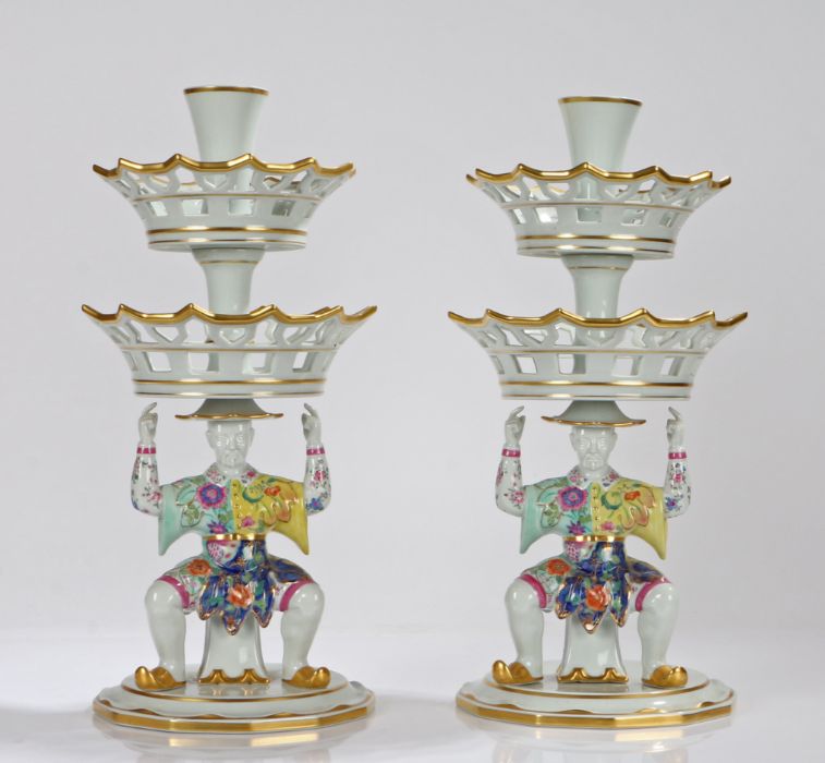 Pair of Mottahedeh porcelain epergnes, with two basket tiers above an Oriental figure in - Image 2 of 2