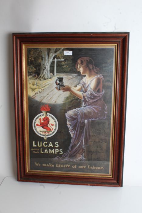 Reproduction Lucas Lamps poster, "We make light of our labour", housed in a glazed frame, the poster