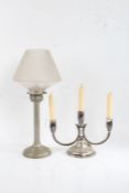 Candlestick with frosted glass shade above a pierced top section, cylindrical stem and stepped foot,