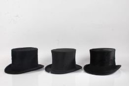 Three various gentleman's top hats, to include Dunn & Co (20cm front to back, 16cm side to side,),