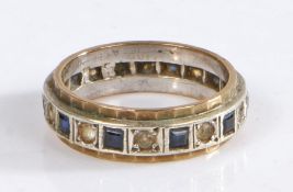 Yellow metal eternity ring set with paste and sapphires, weight 4.0 grams ring size M