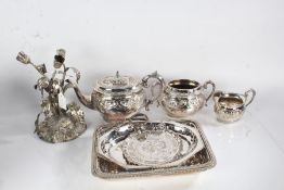 Silver plated ware, to include tureen and cover, three piece tea set, foliate table centrepiece,