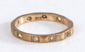 9 carat gold and paste eternity ring, weight 1.7 grams ring size L (2 stones missing)