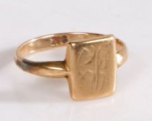Gold coloured metal signet ring, the rectangular head with feint monogram, ring size J, 1.7g