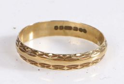 9 Carat Gold Wedding Band, with a repeating pattern to the rim, ring size Q weight 1.2 grams