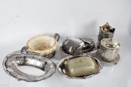 Silver plated ware, to include egg cruet, biscuit barrel, pedestal fruit bowl with porcelain