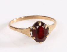 9 carat gold ring, set with an oval garnet, ring size L, 1.3g