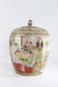 Chinese Canton style vase and cover, decorated with a seated figure and attendants within a floral