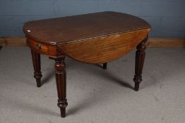 19th century mahogany drop leaf table, the circular top raised on four reeded legs, fitted single