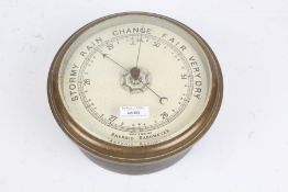 Brass cased bulk head style aneroid barometer, 23cm diameter